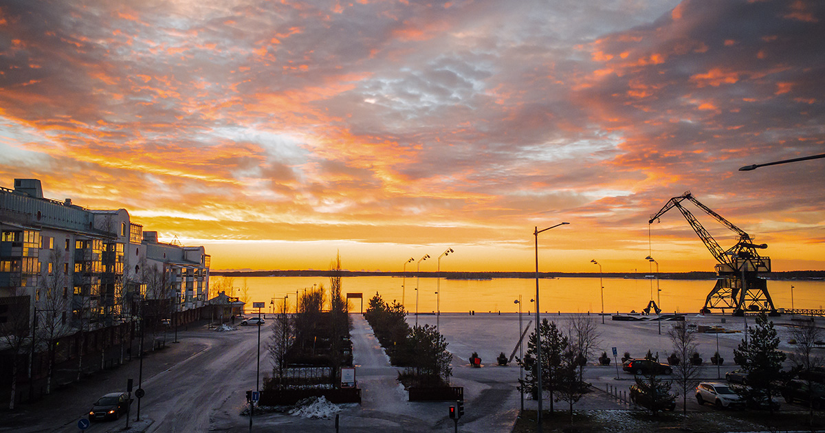 Solnedgång i Luleå från SITES kontor i södra hamn liggande bild